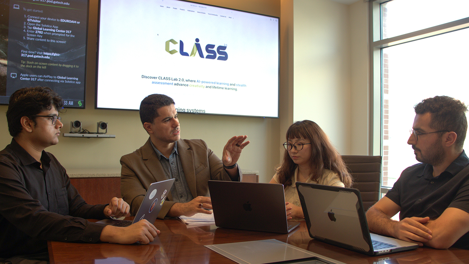 Rahimi (second from left) with students from his CLASS Lab 2.0.